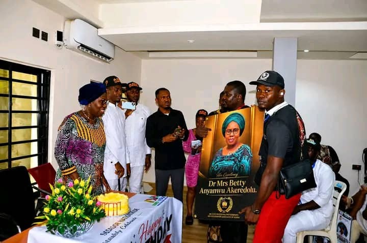 ISPPAN delegation showcasing the commemorative portrait with Her Excellency Dr. Mrs. Betty Anyanwu-Akeredolu alongside birthday celebrations.